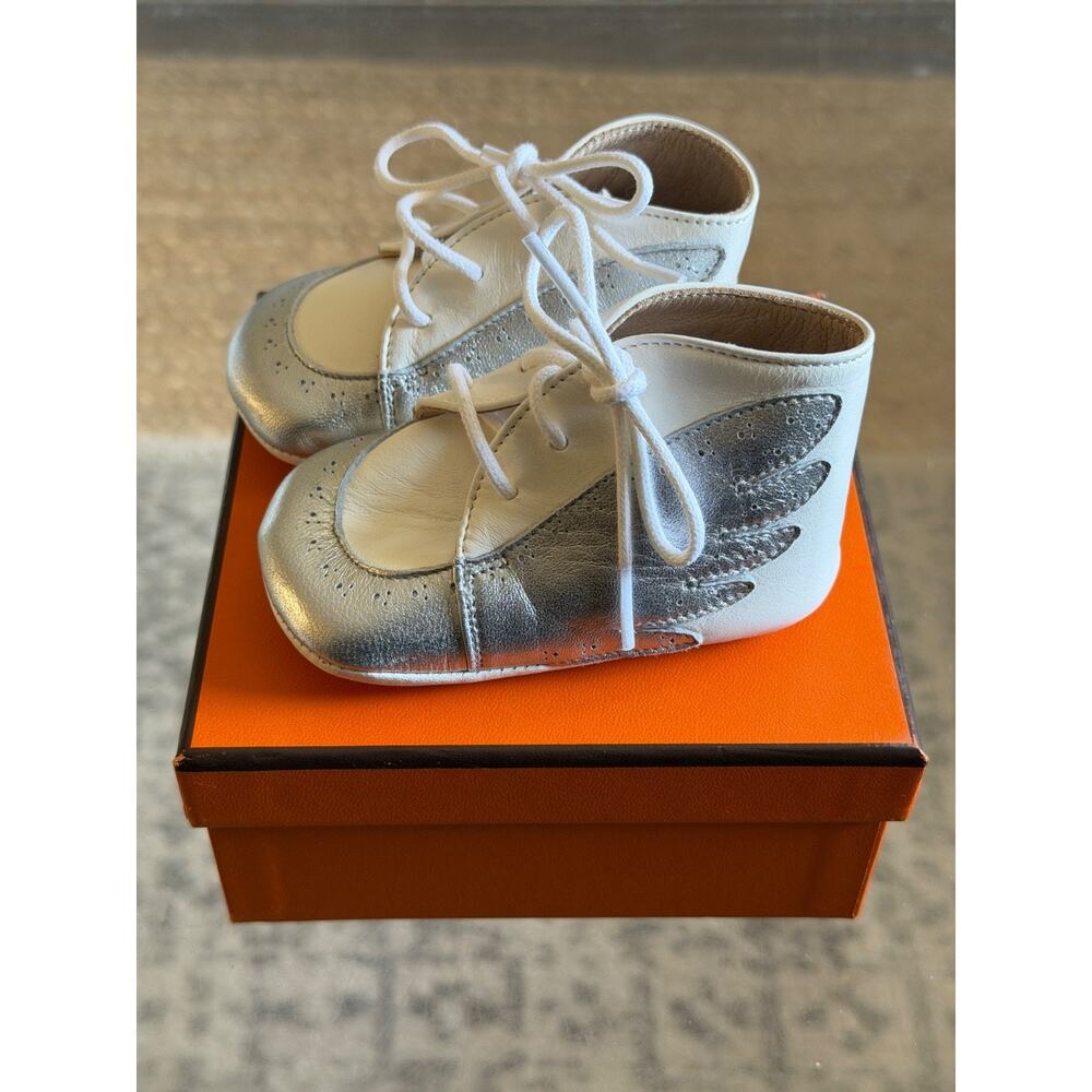 RARE Hermès Lambskin Baby Shoes (Size 18) – White with Silver Cap Toe & Wing De